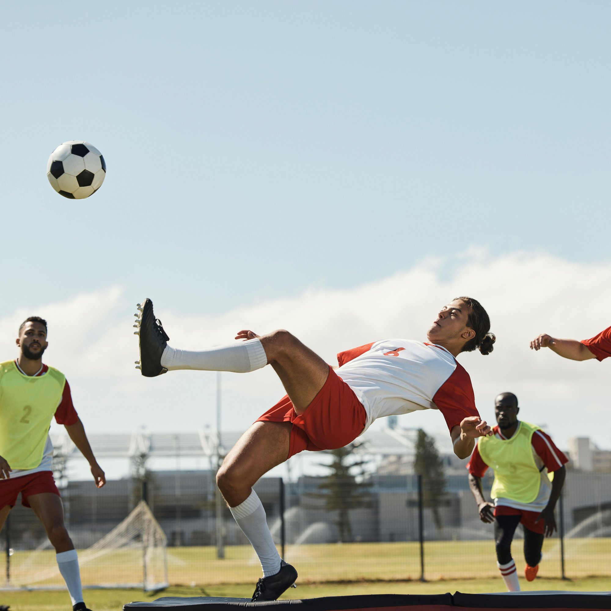 Sports Soccer player attempting Bicycle kick